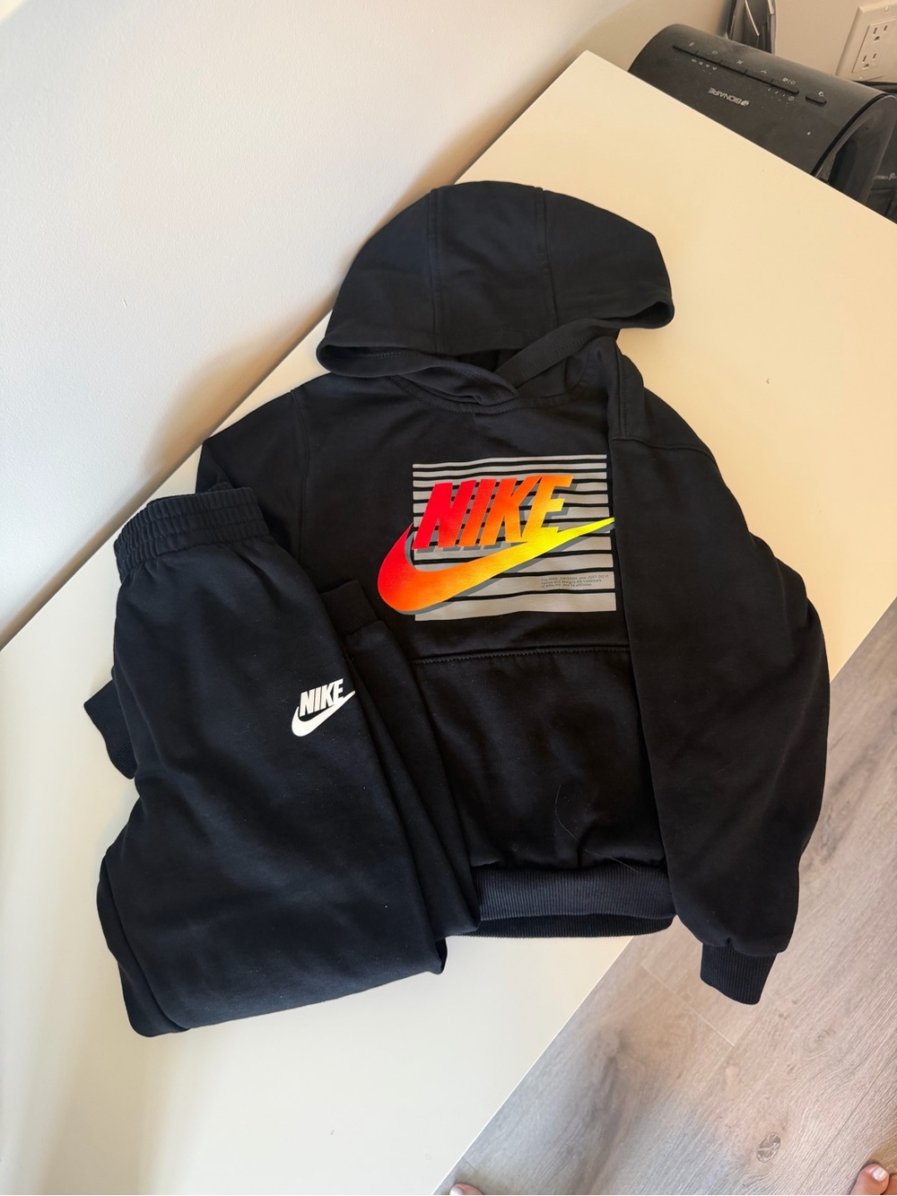 Nike Black Hoodie with Red-Orange-Yellow Gradient Swoosh